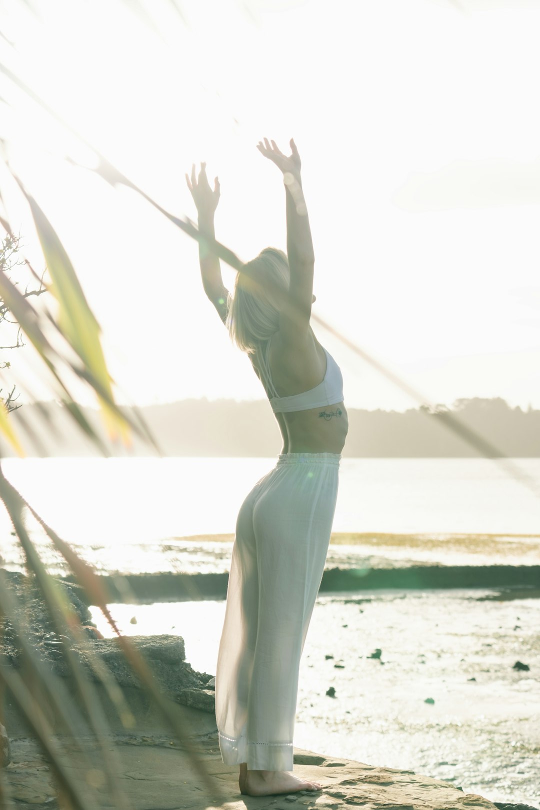 services-02 woman-standing-near-body-of-water-zdldggbi9ow